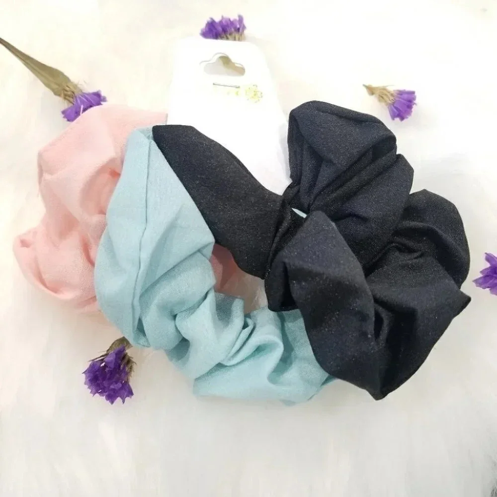 Pink, blue and black scrunchies